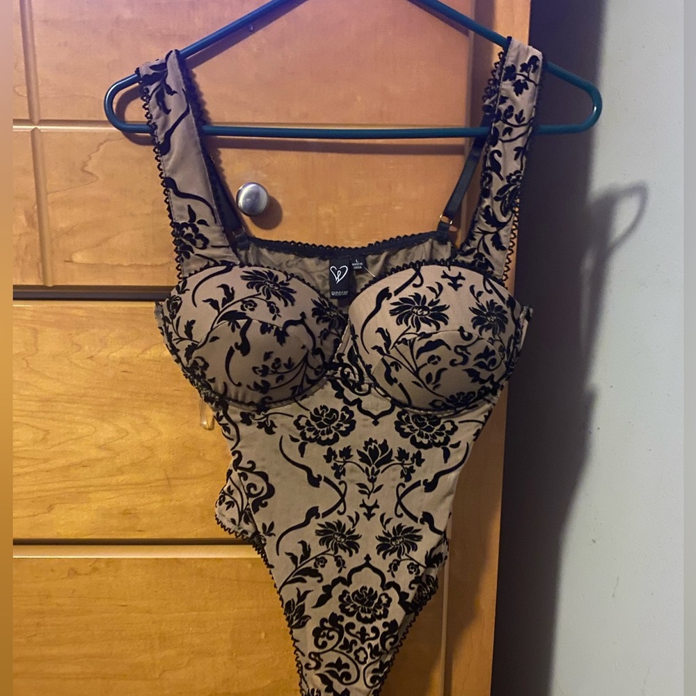 Tan and black bodysuit